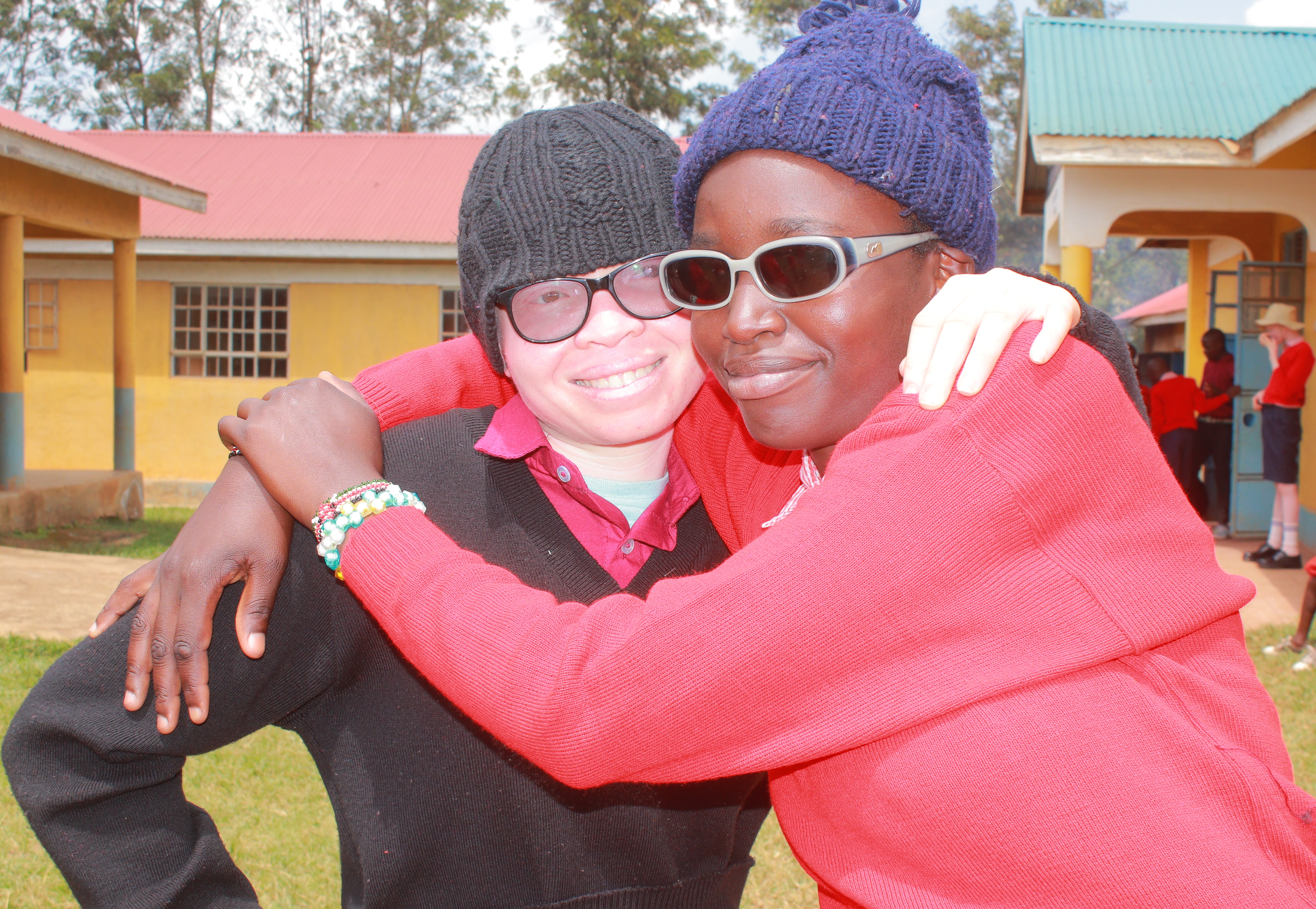 NEO Empowerment Organization team working with visually impaired women